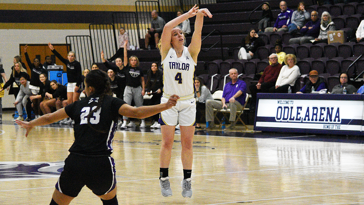Fourth-Quarter Free Throws Secure Significant CL Win for Taylor