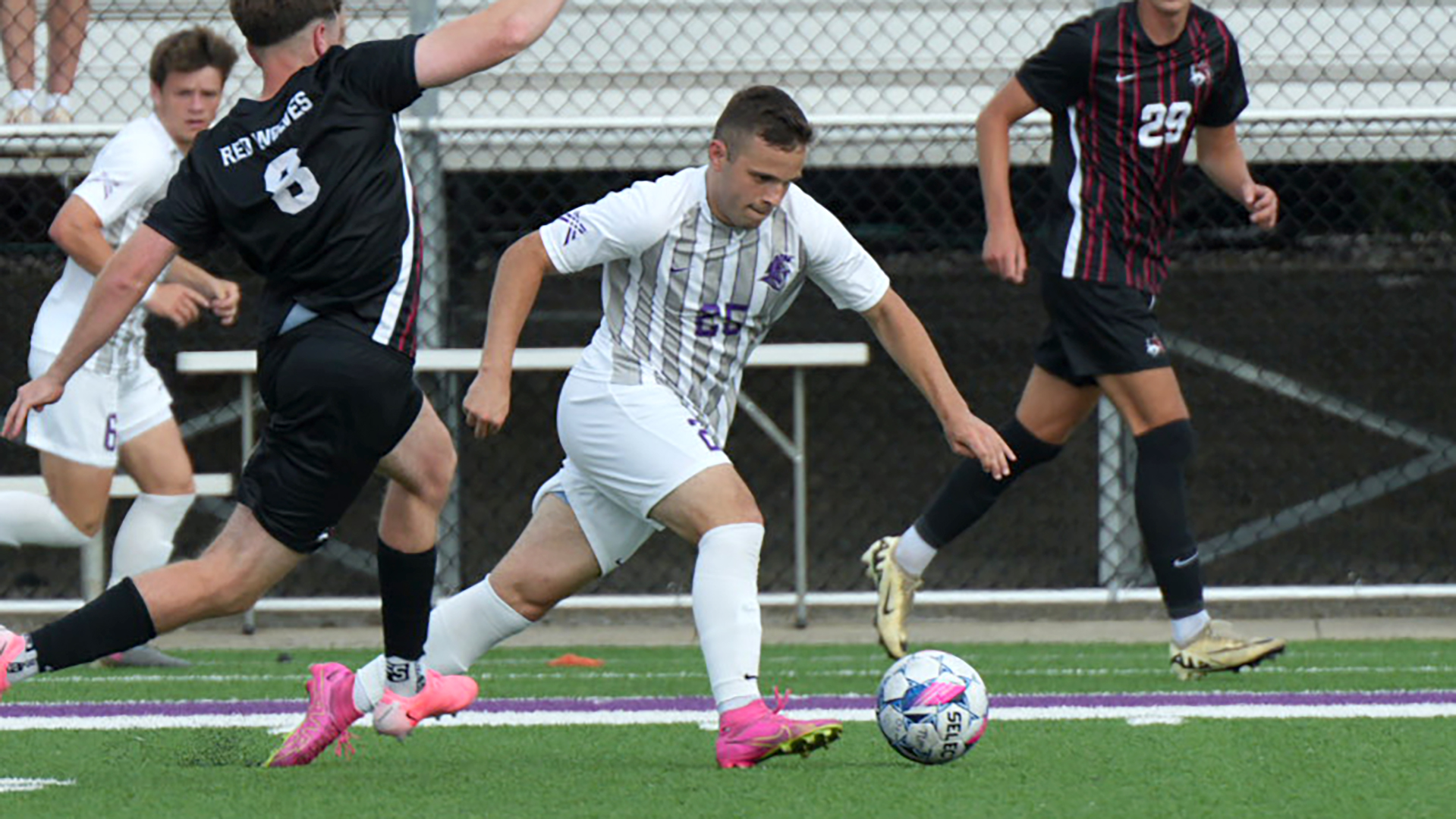 Second-Half Rally Earns Trojans a Draw in Crossroads League Opener